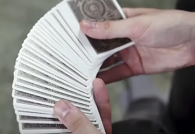 Suffling playing cards Suffling playing cards